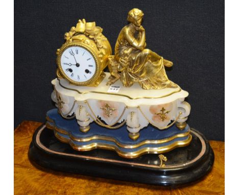 A late 19th early 20th century Continental figural mantle clock, the movement stamped Brevete 3983, with gilt metal seated fe