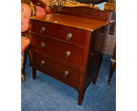 A mahogany three drawer bedroom chest, decorated with ring handles, 82cm high x 71cm wide x 44cm deep