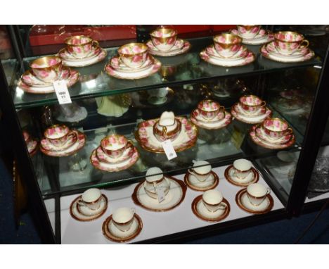 A Royal Albert floral decorated china teaset, comprising of two biscuit plates, cream and sugar, 12 plates, 12 cups, 12 sauce