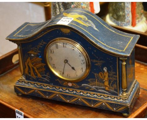 A chinoisserie mantle clock, decorated with gilded figures in foliage on a blue ground, 18cm high