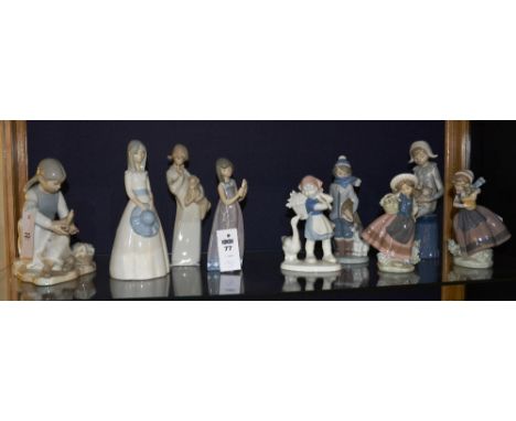 Four assorted Lladro statuettes, all approx 20cm high, together with two Nao figures, two Spanish statuettes and a German fig