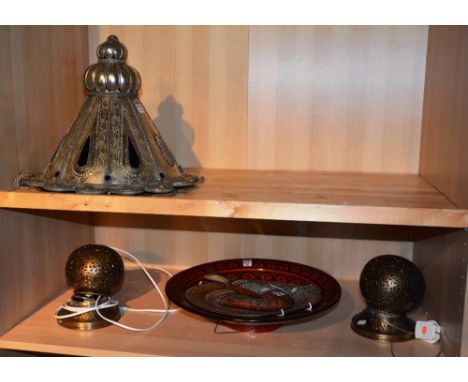 A Moroccan silvered hanging lamp, with a pair of similar bedside lamps, an Eastern red glazed pottery bowl, similar copper wa