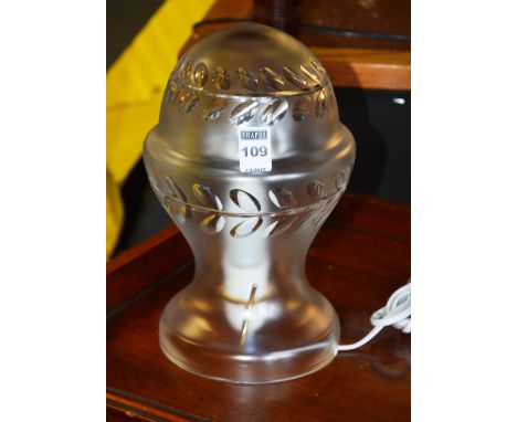 A glass table lamp, with mushroom style top above circular base, signed Webb, 24cm high