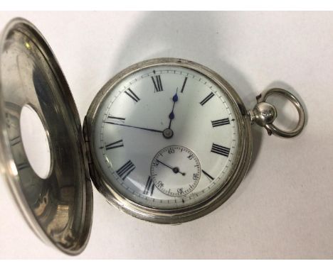 A silver-cased half-hunter pocket watch, the white enamel dial with Roman numerals denoting hours and subsidiary seconds dial