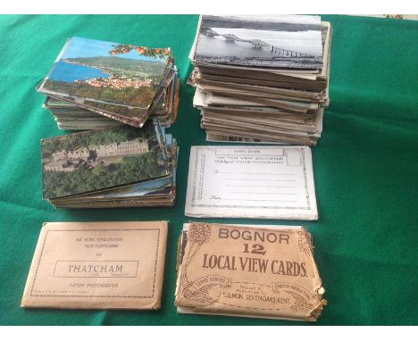 Approximately 560 postcards in a shoebox ' plus some photos, lettercards, calendar cards, three modern books of tear-away pos