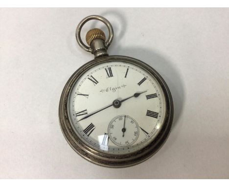 A silver-cased Elgin National Watch co. Open-faced pocket watch, the white enamel dial with Roman numerals denoting hours and