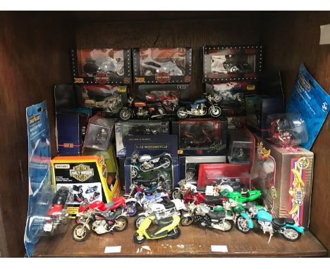 SECTION 41. A collection of approximately 40 assorted die-cast model motorcycles, predominantly boxed, some loose, including 