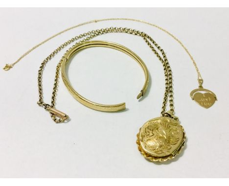 A 9ct yellow gold belcher chain with engraved oval pendant, with a 9ct yellow gold heart pendant and a hollow gold bangle (br