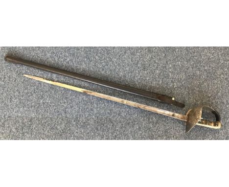 An ERII Colonial Police Officer's Dress sword, by Wilkinson, 23" fullered blade with etched decoration, foliate pierced full 