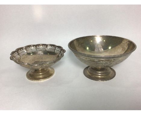 A silver bowl on raised on circular spreading foot, with engine turned and scrolling foliate decoration, Sheffield, 1863, mak