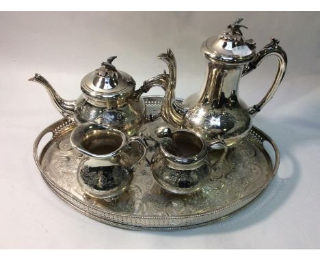 A four-piece EPNS tea and coffee service on oval galleried chair (5) 
