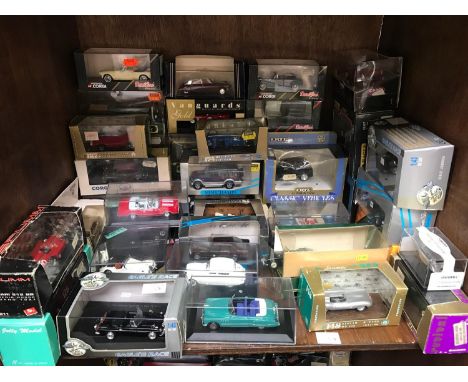 SECTION 54. A collection of 42 assorted boxed die-cast model cars including examples by Lledo, Paul's Model Art and Corgi etc