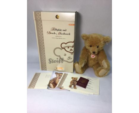 A Steiff collector's bear no. 037160, with press and listen music box playing 'Ode to Joy', golden blonde mohair, limited edi