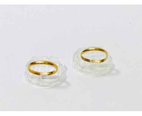 Two 22ct gold wedding rings, finger size J and K, total weight 3.9 grams. 