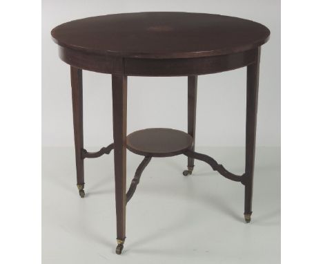 An attractive Edwardian inlaid mahogany circular Centre Table, with underneath shelf, on square tapering legs and brass casto