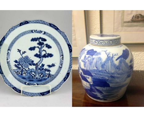 A large Nankin blue and white Chinese porcelain Charger, 38cms (15") diameter; together with a large blue and white Chinese p