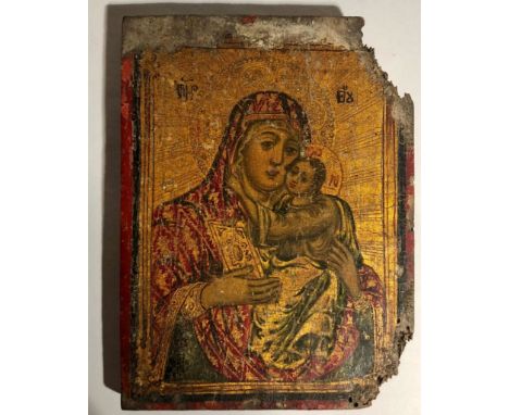 A late 18th Century / early 19th Century Russian Icon, of the Madonna and Child, painted on wooden panel, with gilt highlight