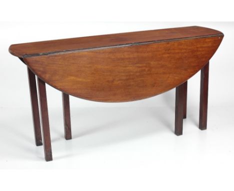A 19th Century Irish light mahogany drop leaf Wakes or Hunt table, on square chamfered legs, approx. 152cms (5') long. (1)