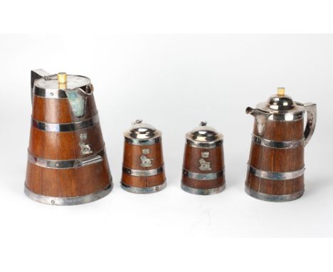 An unusual and rare suite of 4, 19th Century oak beer Jugs and Tankards, with plated bands, including two graduating jugs, an