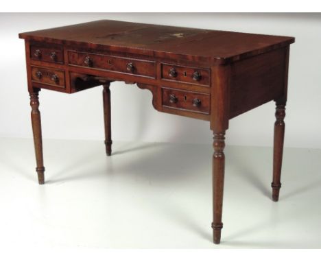 An attractive late William IV Irish mahogany kneehole Writing Table, the rectangular top with lift up centre panel and leathe