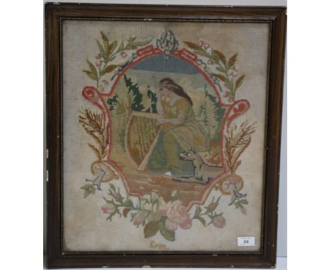 An attractive Needlework Picture, depicting "Maid of Erin," seated with harp and wolfhound by her side enclosed in a shield s