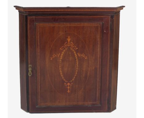 A fine quality Edwardian inlaid mahogany Hanging Corner Cabinet, the panel door with large inlaid decoration. (1)