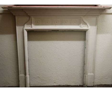 A Victorian cast iron break front Fire Surround, decorated in the classical taste, with moulded shelf approx. 155cms wide x 1