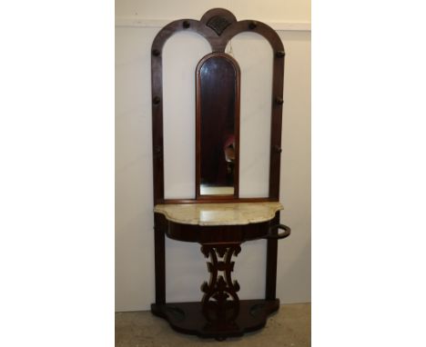 A good quality large late Victorian carved mahogany mirror back Hall Stand, with glove compartment and with heavy brass coat 