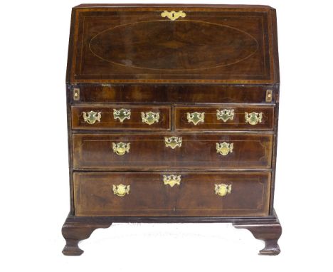 A fine Georgian period drop front inlaid mahogany Bureau, the figured slope front with oval herringbone inlay and crossbandin