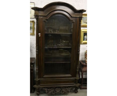A very good attractive carved walnut Display Cabinet, glazed on three sides, the large front glazed panel door flanked by tur