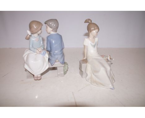 Two Nao Figurines