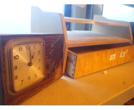 Wall hanging shelf with drawer and an oak cased clock