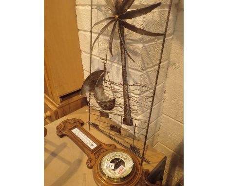 Banjo weather station barometer and thermometer and a wire art wall hanging of a ship / palm tree