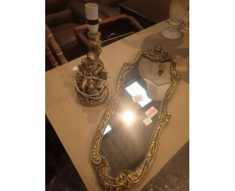 Cast gilt framed mirror and matching table light