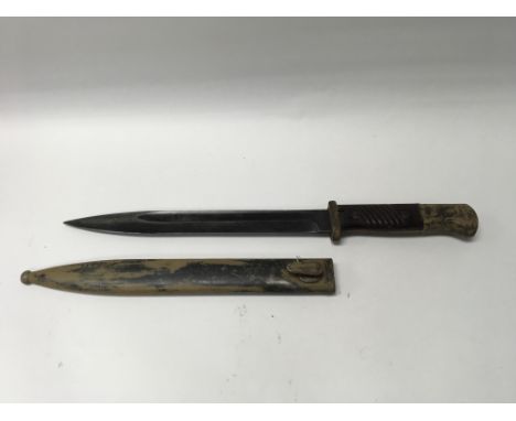 German WW2 style Africa Corps (D.A.K) Mauser K-98 Bayonet with D.A.K logo engraved on the pommel, possibly done in a local ba