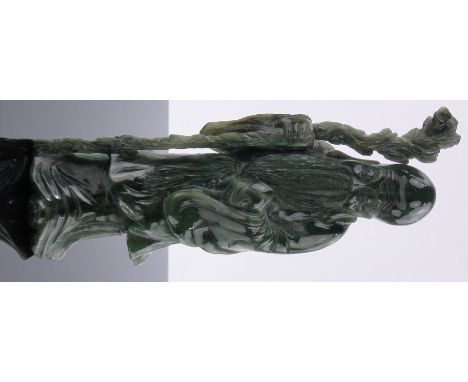 A carved jade figure of an Immortal,height 7.5".