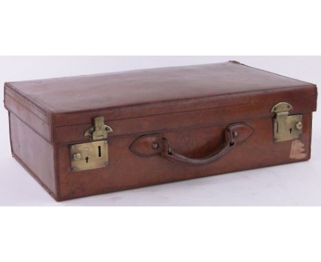 A Vintage leather suitcase with brass locks,length 23.75".