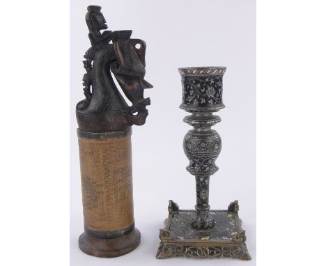 An ornate Middle Eastern brass and champlevee enamelled candlestick,on pierced cast brass platform base, height 7.5" and an u