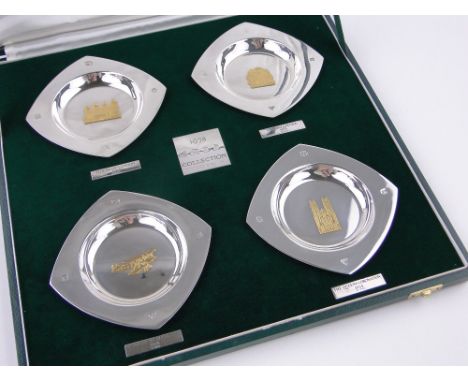 A cased set of 4 Garrard's 1978 Collection silver dishes,including First Flight to Australia 1928, 13.5cm across, gross weigh