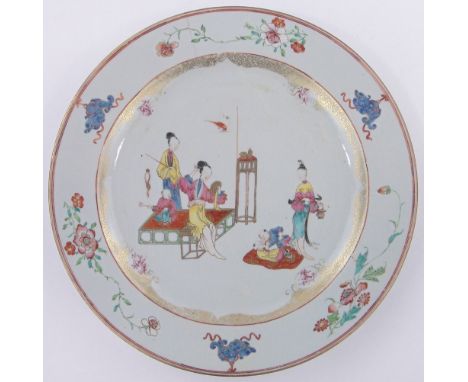 A large Chinese porcelain plate,with painted design depicting court interior scene and children playing, 14.75" across, a/f.