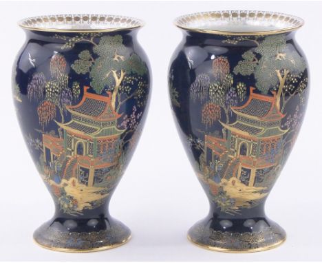 Pair of Carltonware Bleu Royale vases,with painted and gilded pagoda designs, height 7.75".