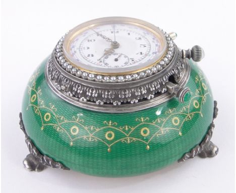 An unusual Russian silver and green and gilt guilloche enamel cased table clock in the manner of Fabergé,with quarter repeat 