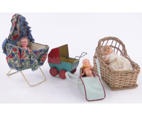 A Vintage rosebud doll,height 6", 2 small plastic dolls, a tinplate doll's pram, etc.