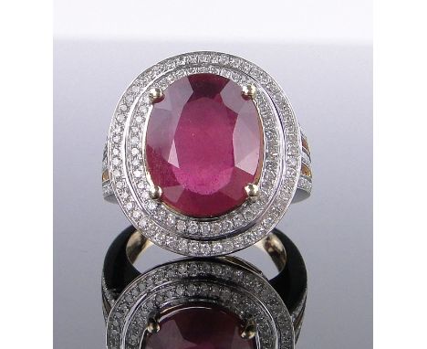 A large 18ct gold ruby and diamond panel ring,ruby approx. 7cts, total diamond content approx. 1.25cts, panel height 20mm, si