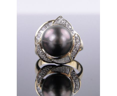 An 18ct gold Tahitian black pearl and diamond ring,pearl approx. 12mm across, surrounded by brilliant and baguette-cut pave s