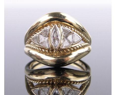 An 18ct gold diamond ring by Alan Gard of Hatton Garden,set with approx. 0.9cts of marquise and triangular cut diamonds, cent