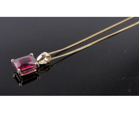 An 18ct gold ruby set pendant,ruby height 8mm.