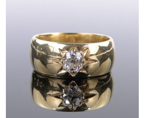 A gent's heavy 18ct gold signet ring,set with a single diamond, approx. 0.5cts, size O, 10.1 grams.