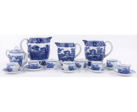 A set of three graduated Copeland Spode "Tower" pattern jugs,largest height 6.5", (1 cracked) and a Ridgways child's blue and