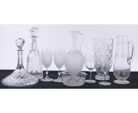 A ships decanter and stopper,height 10.25", two water jugs with matching pairs of glasses, etc.